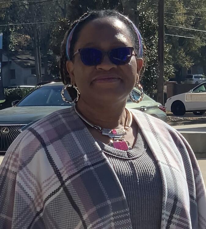 Ijeoma smiling and forward